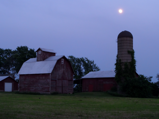 Barn and silo at dusk