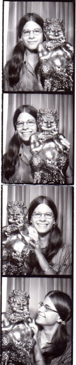 4 black and white images of me holding Mr. Tumnus