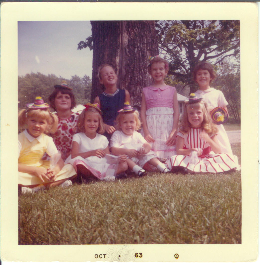 Dona turns 7. Eight girls at a birthday party.