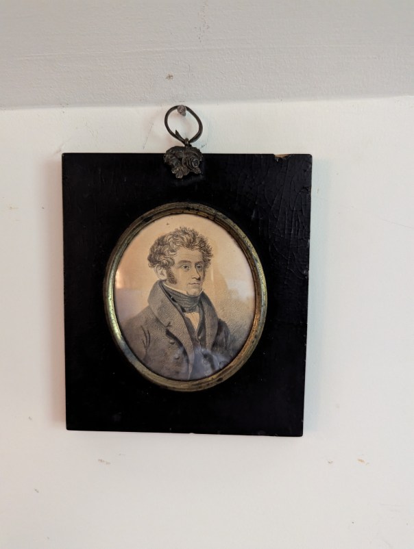 Portrait of a man wearing clothes from early 1800s